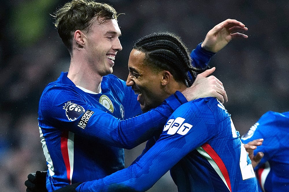 | Photo: Nick Potts/PA via AP : Chelseas Cole Palmer, left, celebrates scoring their sides second goal of the game with team-mate Joao Pedro during an English Premier League soccer match against against Leeds United in London.