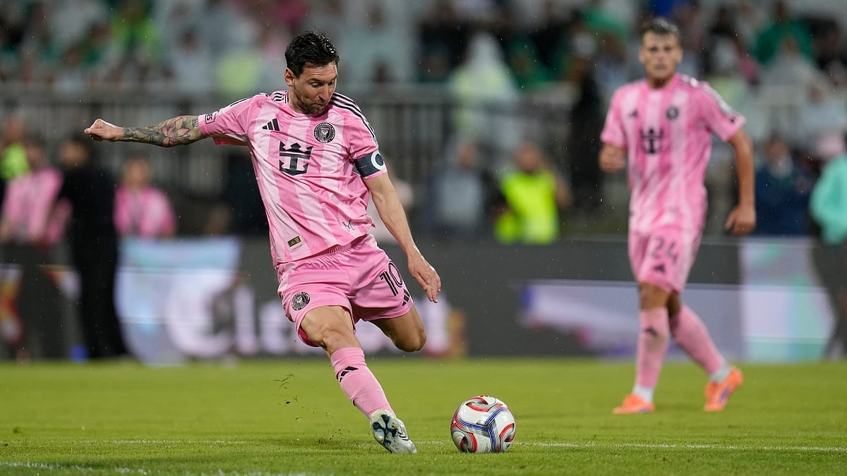 | Photo: AP/Fernando Vergara : Inter Miamis Lionel Messi winds up to kick the ball during an international friendly soccer match against Colombias Atletico Nacional in Medellin, Colombia, Saturday, Jan. 31, 2026.
