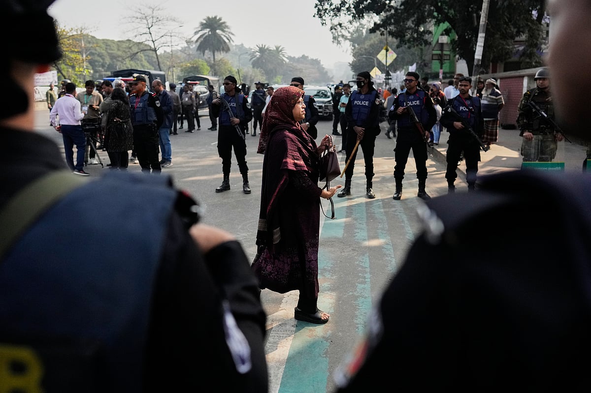 Anupam Nath/AP : A Bangladeshi woman arrives to cast her vote at a polling station during national parliamentary election in Dhaka, Bangladesh, Thursday, Feb. 12, 2026. (AP Photo/Anupam Nath)