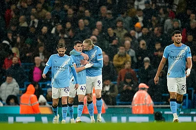 | Photo: AP/Dave Thompson : Manchester Citys Erling Haaland, center, celebrates with teammates after scoring his sides third goal during the English Premier League soccer match between Manchester City and Fulham in Manchester, England.