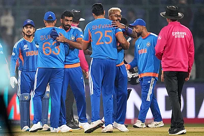 | Photo: AP/Manish Swarup : Indias players celebrate after winning their T20 World Cup cricket match against Namibia in New Delhi.