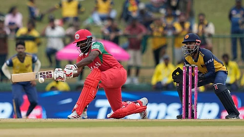 AP : Mohammad Nadeem bats during the ICC T20 World Cup 2026 match between Oman and Sri Lanka in Pallekele.