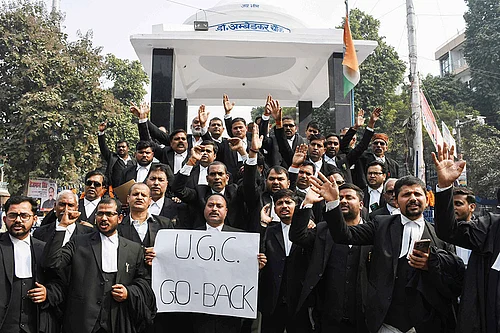 | Photo: IMAGO/ANI News : Advocates of Allahabad High Court stage a protest against UGC over new caste-based equality rules in colleges Prayagraj, Uttar Pradesh