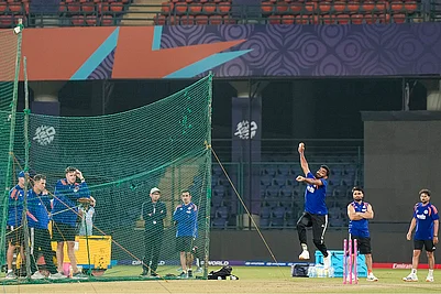 | Photo: PTI/Salman Ali : Indias Jasprit Bumrah bowls a delivery during a practice session ahead of an ICC Mens T20 World Cup 2026 cricket match between India and Namibia, at the Arun Jaitley Stadium, in New Delhi. BCCI selection committee Chairman Ajit Agarkar, the team’s head coach Gautam Gambhir, bowling coach Morne Morkel and players Rinku Singh and Kuldeep Yadav are also seen.