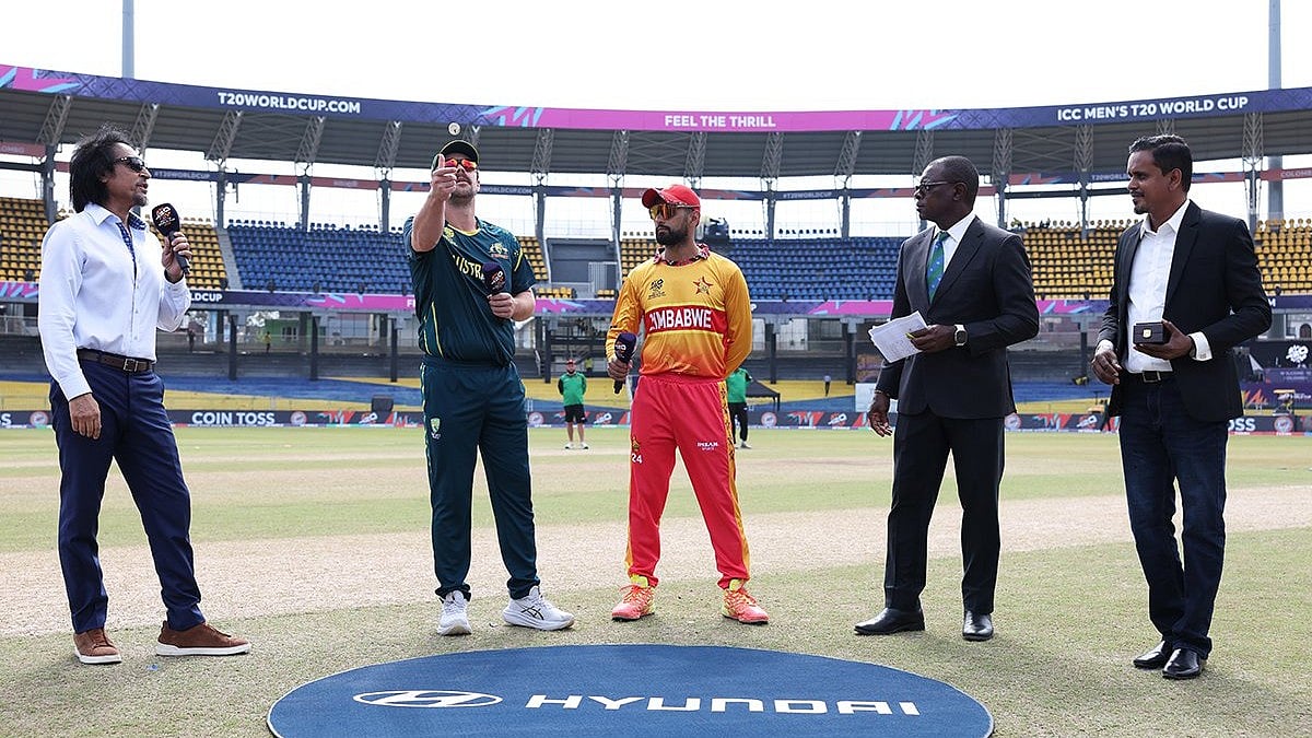 ZimCricketv/X : Travis Head and Sikandar Raza at toss of Australia vs Zimbabwe ICC T20 World Cup 2026 Group B clash. 