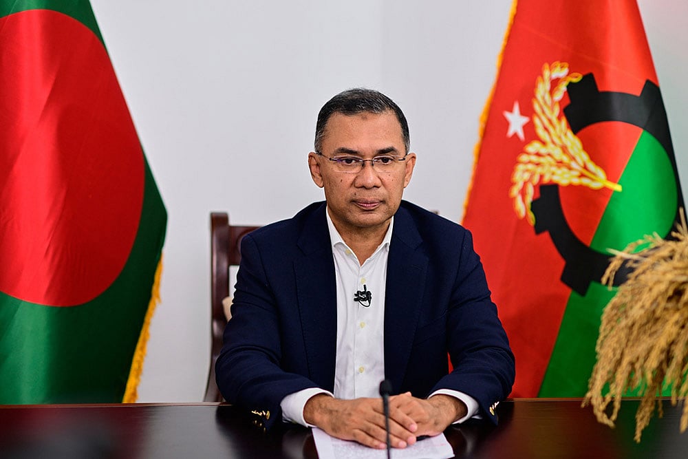 | Photo: AP/Mahmud Hossain Opu : Bangladesh Nationalist Party Chairperson Tarique Rahman poses for a photograph in his party office in Dhaka, Bangladesh.