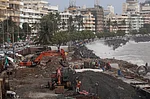IMAGO / NurPhoto
: Labourers working at the coastal road construction site, as the waves crash at a seafront in Mumbai, India, on June 13, 2023Labourers working at the coastal road construction site, as the waves crash at a seafront in Mumbai, India, on June 13, 2023