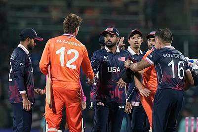 | Photo: AP/Mahesh Kumar A : United States captain Monank Patel, centre, shake hands with Netherlands Fred Klaassen after they won the T20 World Cup cricket match against Netherlands in Chennai, India.