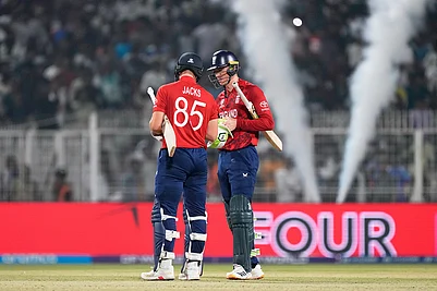 | Photo: AP/Bikas Das : Englands Will Jacks, left, and batting partner Tom Banton celebrate after England won the T20 World Cup cricket match against Scotland in Kolkata.