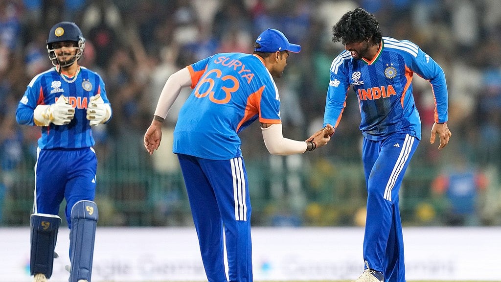 Eranga Jayawardena : Tilak Varma, right, and captain Suryakumar Yadav celebrate the wicket of Shadab Khan during the T20 World Cup match between India and Pakistan in Colombo, Sri Lanka.