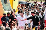 Tamilaga Vettri Kazhagam (TVK) President Vijay waves as he arrives for the public meeting in the Salem district, Tamil Nadu