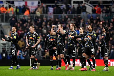 | Photo: Jacob King/PA via AP : Leeds United players celebrate after winning the penalty shoot out at the end of the Emirates FA Cup fourth round match between Leeds United and Bimingham City, in Birmingham, England.