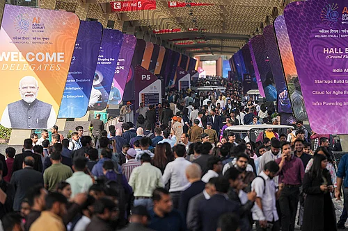 | Photo: PTI/Ravi Choudhary : Visitors during the India AI Impact Summit 2026 at Bharat Mandapam, in New Delhi.