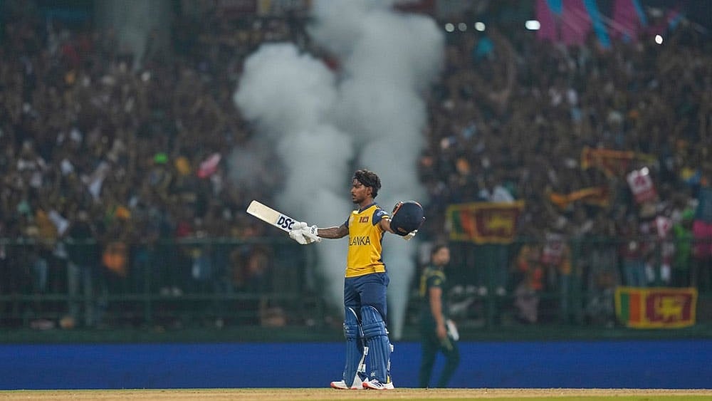 Photo: AP/Eranga Jayawardena : Sri Lankas Pathum Nissanka celebrates his century during the T20 World Cup cricket match between Sri Lanka and Australia in Pallekele, Sri Lanka.