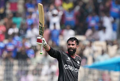 | Photo: AP/Mahesh Kumar A. : Canadas Yuvraj Samra celebrates his century during the T20 World Cup cricket match between Canada and New Zealand in Chennai.