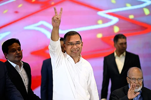MAHMUD HOSSAIN OPU Source: AP : Bangladesh Nationalist Party Chairperson Tarique Rahman greets supporters after his party won the national parliamentary election, in Dhaka, Bangladesh, Saturday, Feb. 14, 2026. (AP Photo/Mahmud Hossain Opu)
