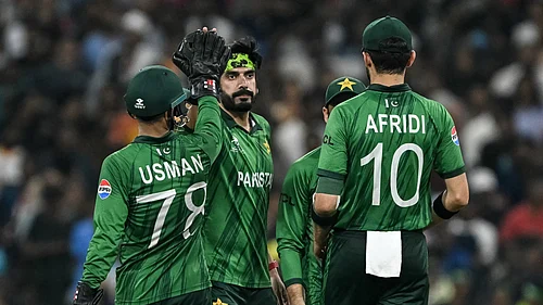 T20WorldCup/X : Pakistan team celebrating a wicket taken by Usman Tariq at the ICC T20 World Cup 2026 in Colombo