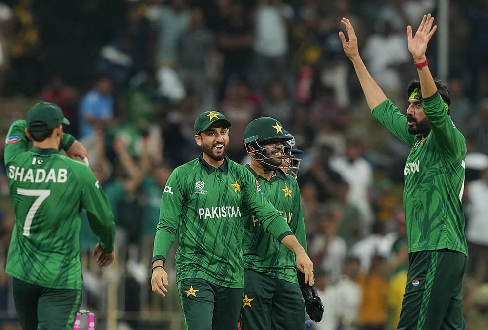 | Photo: AP/Eranga Jayawardena : Pakistans captain Salman Ali Agha, centre, celebrates with teammates after winning T20 World Cup cricket match against Namibia in Colombo, Sri Lanka.
