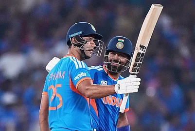 | Photo: AP/Ajit Solanki : Indias Shivam Dube, left, celebrates his fifty runs as batting partner Hardik Pandya applauds during the T20 World Cup cricket match between India and Netherlands in Ahmedabad.