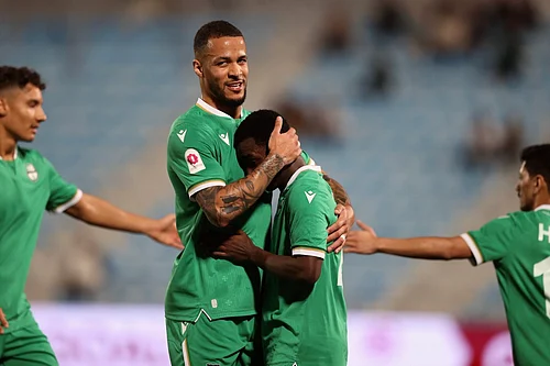 | Photo: X/ahliqat : Al Ahli Doha players celebrate a goal during their Qatar Stars League match against Al-Wakrah on February 16, 2026.