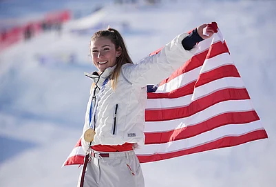 | Photo: AP/Jacquelyn Martin : United States Mikaela Shiffrin celebrates winning the gold medal in an alpine ski, womens slalom race, at the 2026 Winter Olympics, in Cortina dAmpezzo, Italy.