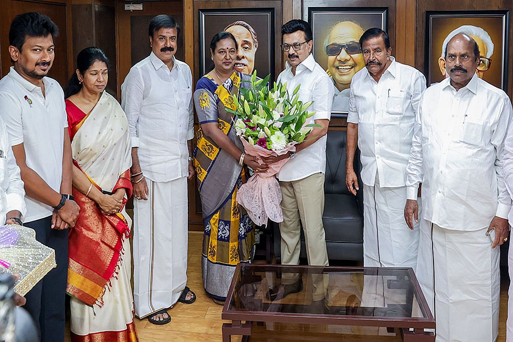| Photo: PTI : Tamil Nadu Chief Minister MK Stalin, state Deputy Chief Minister Udhayanidhi Stalin, DMK MP Kanimozhi Karunanidhi, DMDK General Secretary Premalatha Vijayakanth and others during a meeting, at DMK headquarters in Chennai. DMDK officially joined the DMK-led alliance ahead of the upcoming Tamil Nadu assembly elections. 