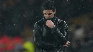 | Photo: AP/Dave Shopland : Arsenal's manager Mikel Arteta reacts during the Premier League soccer match between Wolverhampton Wanderers and Arsenal in Wolverhampton, England, Wednesday, Feb. 18, 2026.