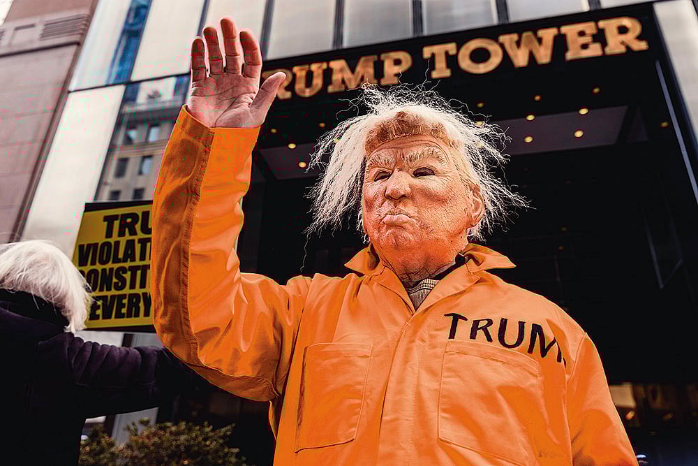 | Photo: Imago/Zuma Press Wire : Trump’s Name is all Over the Epstein files: A demonstrator protesting in New York on February 16, 2026