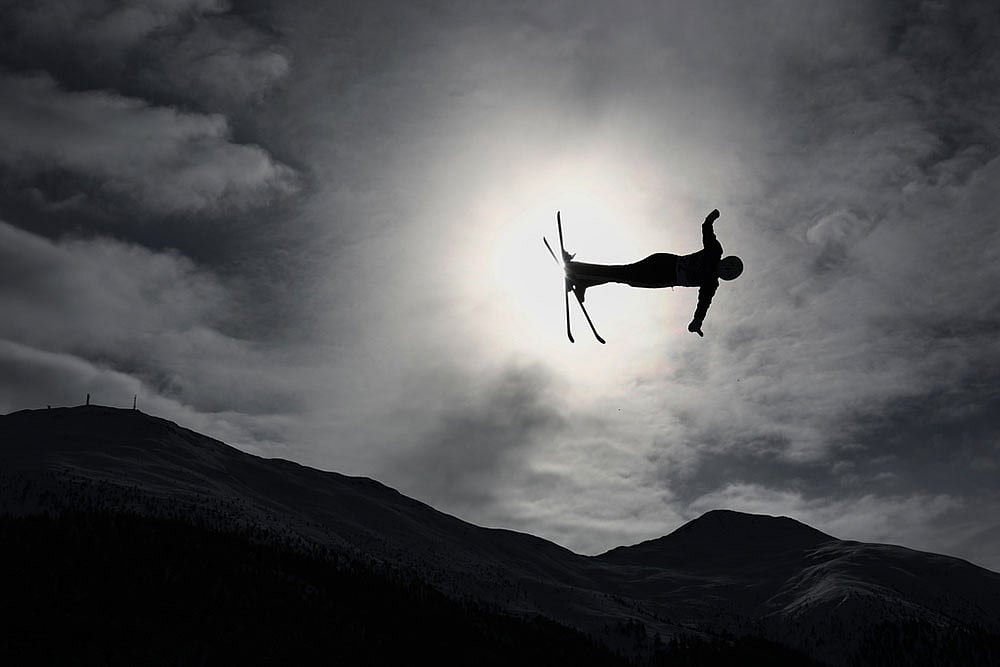 | Photo: AP/Gabriele Facciotti : Czechias Adela Merkova (22) competes during the womens freestyle skiing aerials qualifications at the 2026 Winter Olympics, in Livigno, Italy.
