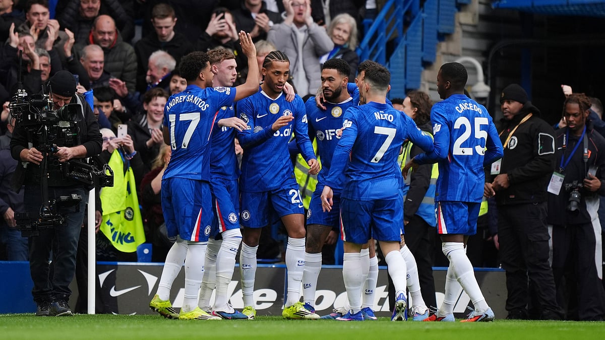 | Photo: AP/Ben Whitley : Chelsea's Joao Pedro celebrates scoring their side's first goal of the game during their English Premier League soccer match against Burnley in London, Saturday, Feb. 21, 2026. 