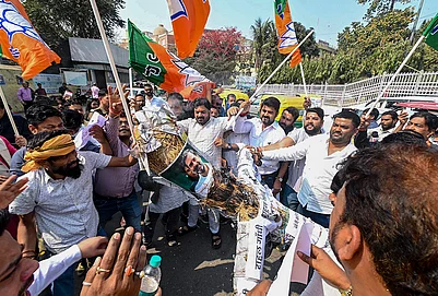 | Photo: PTI : Bharatiya Janata Yuva Morcha (BJYM) activists burn an effigy of Leader of Opposition in the Lok Sabha Rahul Gandhi to protest Youth Congress workers shirtless disruption at the India AI Impact Summit 2026 in New Delhi, in Patna.