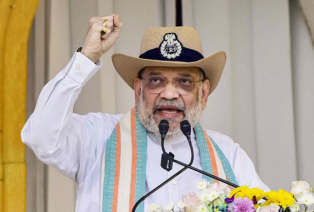 | Photo: PTI; Representative images : Union Home Minister Amit Shah during the 87th Raising Day Parade of the Central Reserve Police Force (CRPF), in Guwahati.