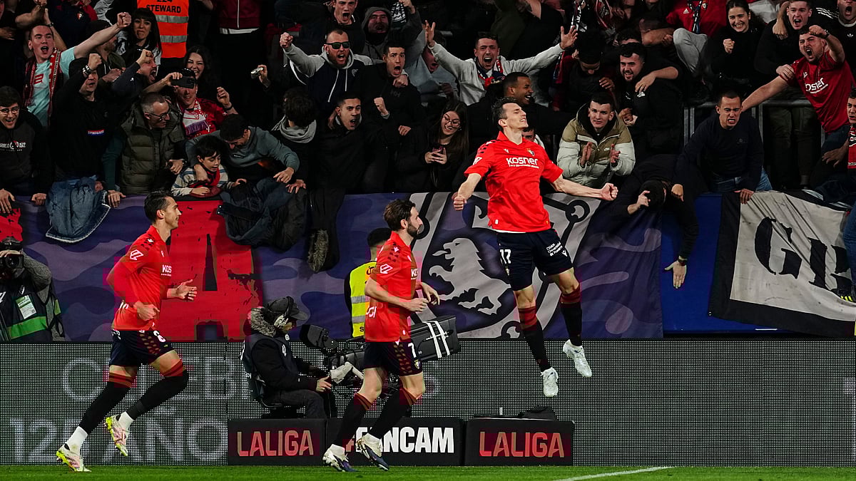 | Photo: AP/Miguel Oses : Osasuna's Ante Budimir celebrates after scoring the opening goal from a penalty kick during a Spanish La Liga soccer match between Osasuna and Real Madrid in Pamplona, Spain, Saturday, Feb. 21, 2026.