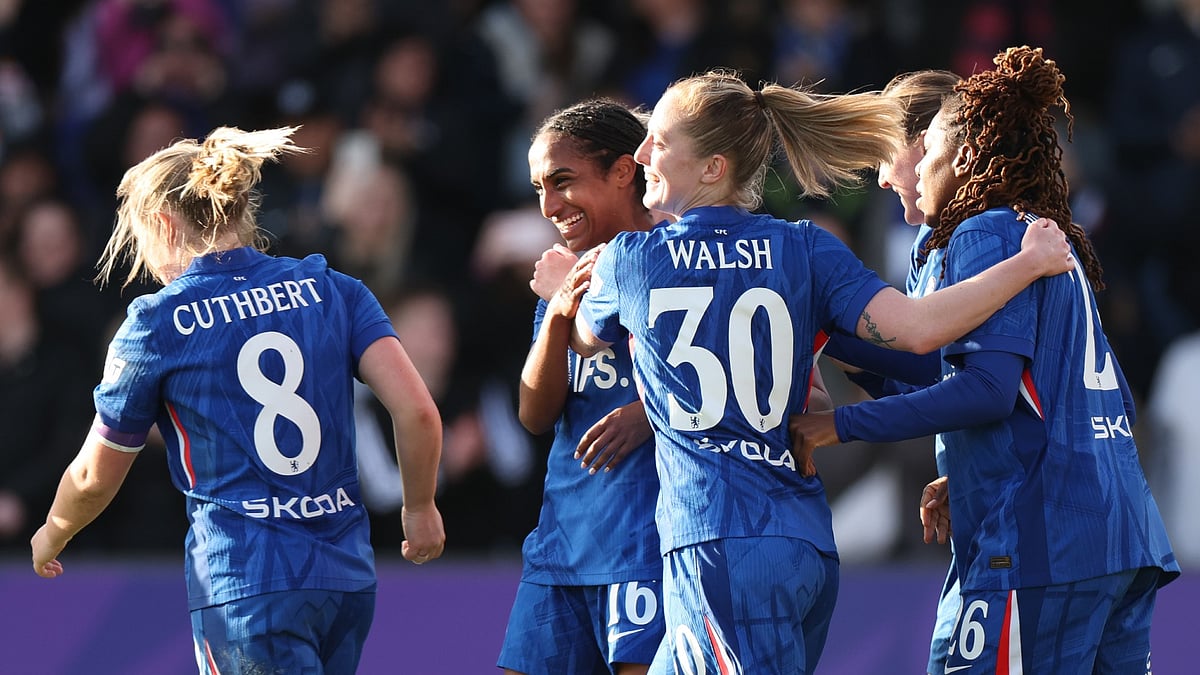 Chelsea celebrate Naomi Girma's winner.