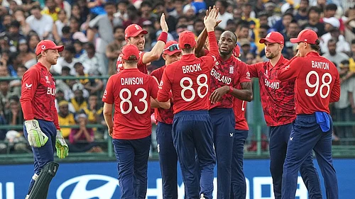AP Photo/Eranga Jayawardena : Englands Jofra Archer, center without cap, celebrates with teammates the wicket of Sri Lankas Kamil Mishara during the T20 World Cup cricket match between Sri Lanka and England in Pallekele, Sri Lanka, Sunday, Feb. 22, 2026.