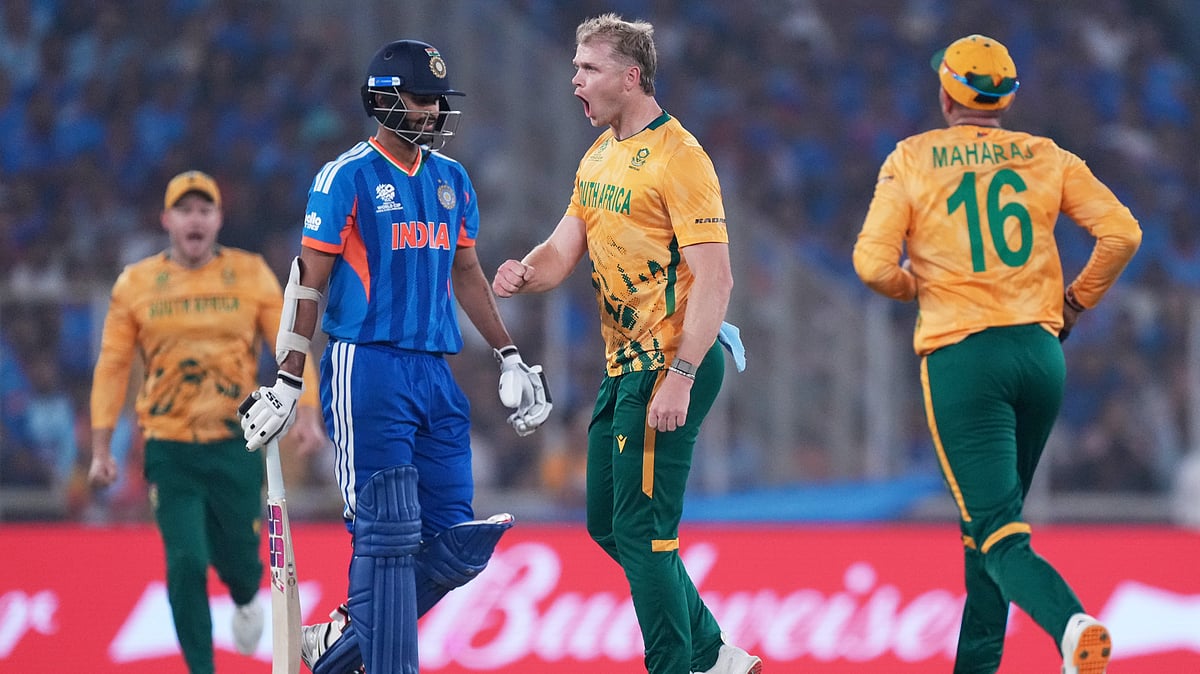(AP Photo/Ajit Solanki) : South Africas Corbin Bosch, second right, celebrates with teammates the wicket of Indias Washington Sundar, second left, during the T20 World Cup cricket match between India and South Africa in Ahmedabad, India, Sunday, Feb. 22, 2026