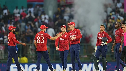 AP Photo/Eranga Jayawardena : England players celebrate after their win against Sri Lanka during the T20 World Cup cricket match in Pallekele, Sri Lanka, Sunday, Feb. 22, 2026.