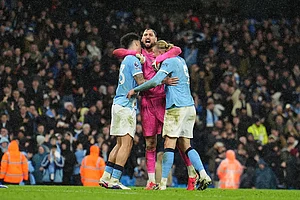 | Photo: Martin Rickett/PA via AP : Manchester City's goalkeeper Gianluigi Donnarumma, center, celebrates with Nico O'Reilly, left, and Erling Haaland after the English Premier League soccer match between Manchetser City and Newcastle in Manchester, England.