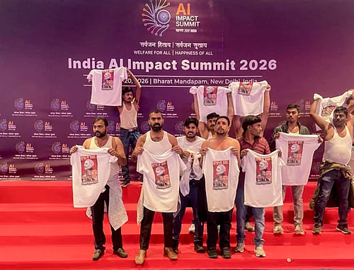 PTI : In this image posted on Feb. 20, 2026, Indian Youth Congress workers stage a protest during the India AI Impact Summit 2026 at Bharat Mandapam, in New Delhi.