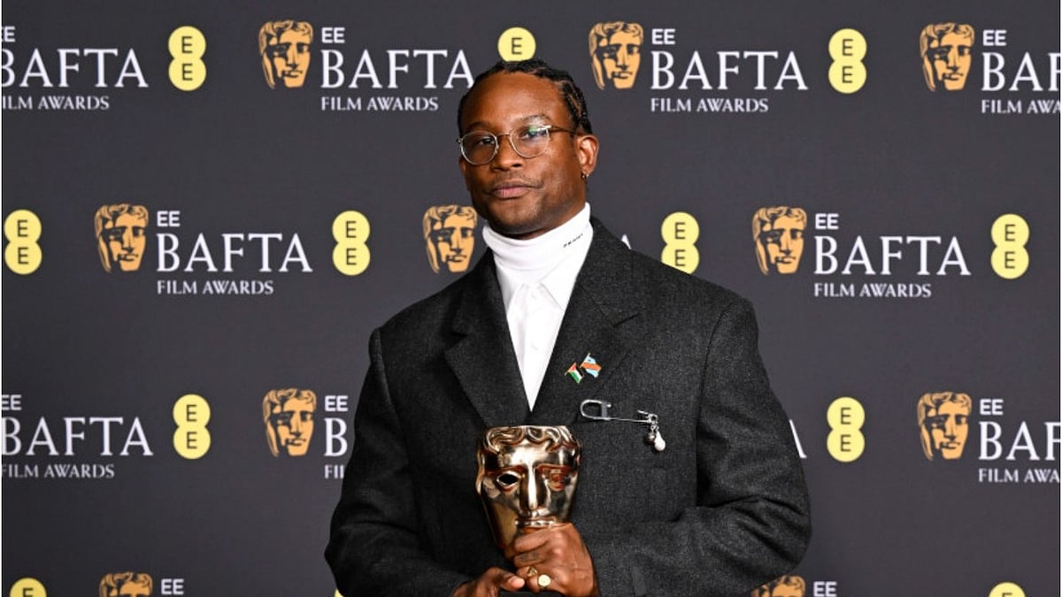 Instagram : Akinola Davies Jr. accepts the Outstanding Debut by a British Writer, Director or Producer award for My Father’s Shadow