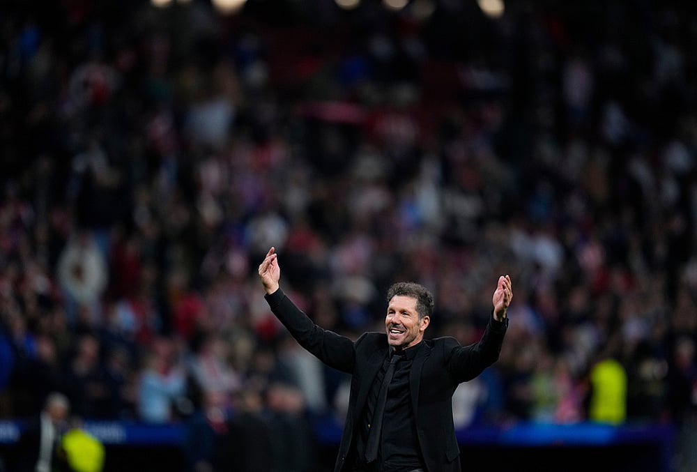 | Photo: AP/Manu Fernandez : Atletico Madrids head coach Diego Simeone celebrates after the Champions League play-off second leg soccer match between Atletico Madrid and Club Brugge, in Madrid, Spain.