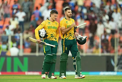| Photo: AP/Ajit Solanki : South Africas captain Aiden Markram, right, and batting partner Ryan Rickelton leave the ground after winning their T20 World Cup cricket match against West Indies in Ahmedabad.