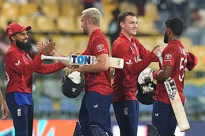 | Photo: AP/Eranga Jayawardena : Englands captain Harry Brook, second from right celebrates with teammates after their win against New Zealand during the T20 World Cup cricket match in Colombo, Sri Lanka.