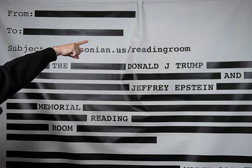 Cliff Owen : An Epstein Reading Room studio backdrop is set up at a rebuttal to President Donald Trumps State of the Union hosted by Defiance.org, the Portland Frog Brigade and COURIER at the National Press Club in Washington, Tuesday, Feb. 24, 2026
