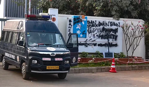PTI : A Karnataka State Police vehicle stationed outside the Azim Premji University campus after alleged vandalism and graffiti reading Ban Spark appeared on the wall following a protest by Akhil Bharatiya Vidyarthi Parishad activists, at Sarjapur, in Bengaluru