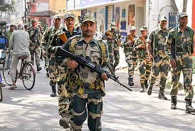 | Photo: PTI : Security personnel patrol on the day the Election Commission is scheduled to publish West Bengals post-SIR electoral rolls, in Nadia, West Bengal.