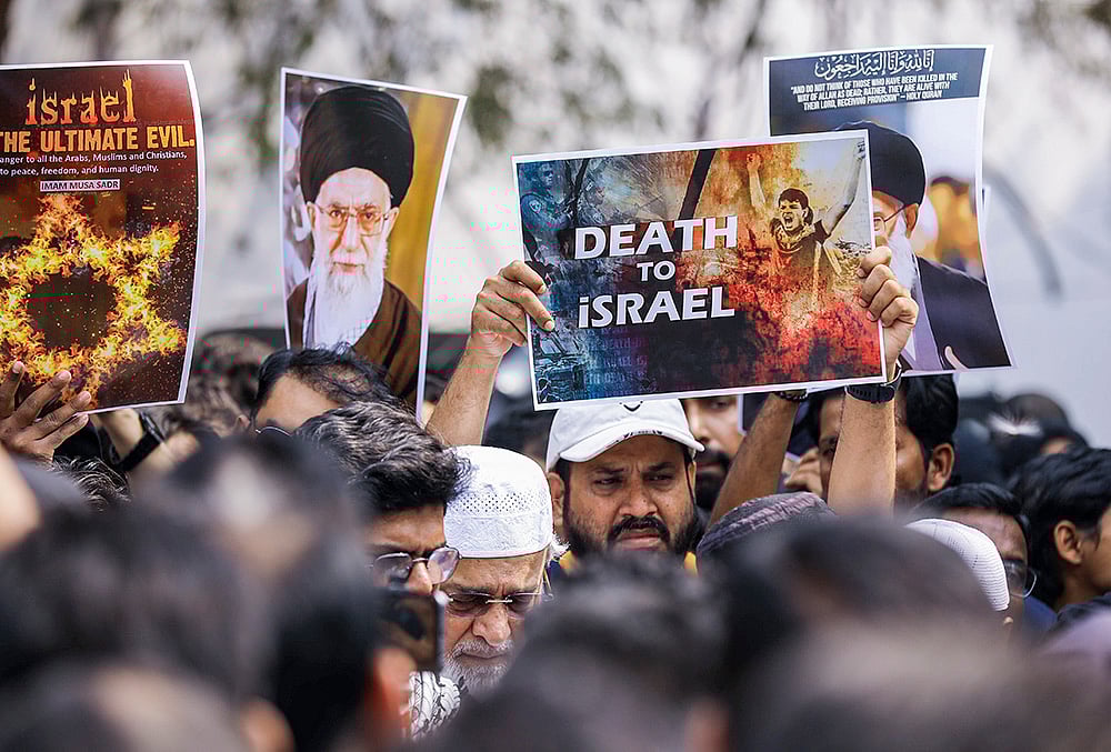 | Photo: PTI : People from the Muslim community stage a protest against the alleged killing of Irans Supreme Leader Ali Khamenei in US-Israel strikes, in Hyderbad.