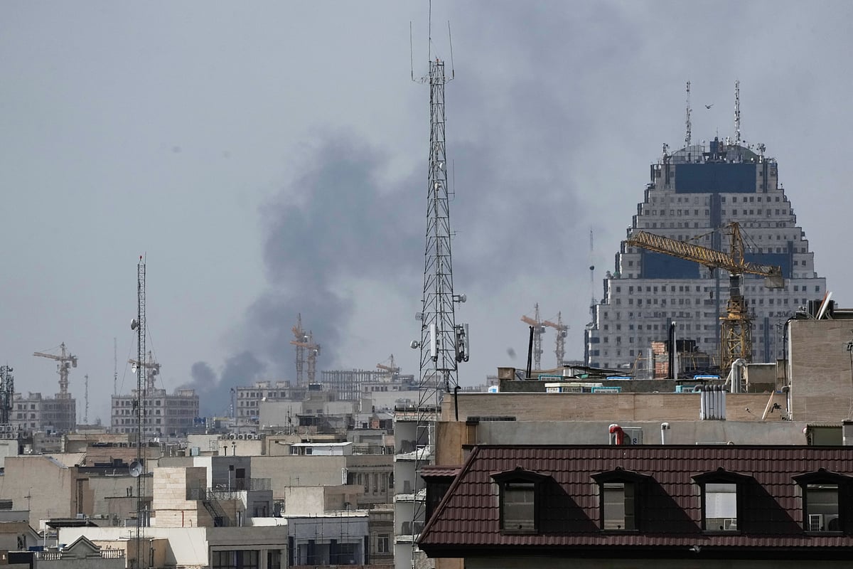 AP Photo : Smoke rises on the skyline after an explosion in Tehran, Iran, Saturday, Feb. 28, 2026.