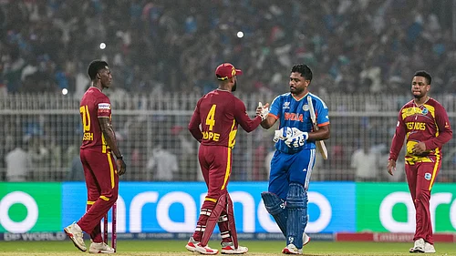 | Photo: PTI : Indias Sanju Samson, second right, being congratulated by West Indies captain Shai Hope and others after winning an ICC Mens T20 World Cup 2026 cricket match between India and West Indies, at the Eden Gardens, in Kolkata, West Bengal, Sunday, March 1, 2026.