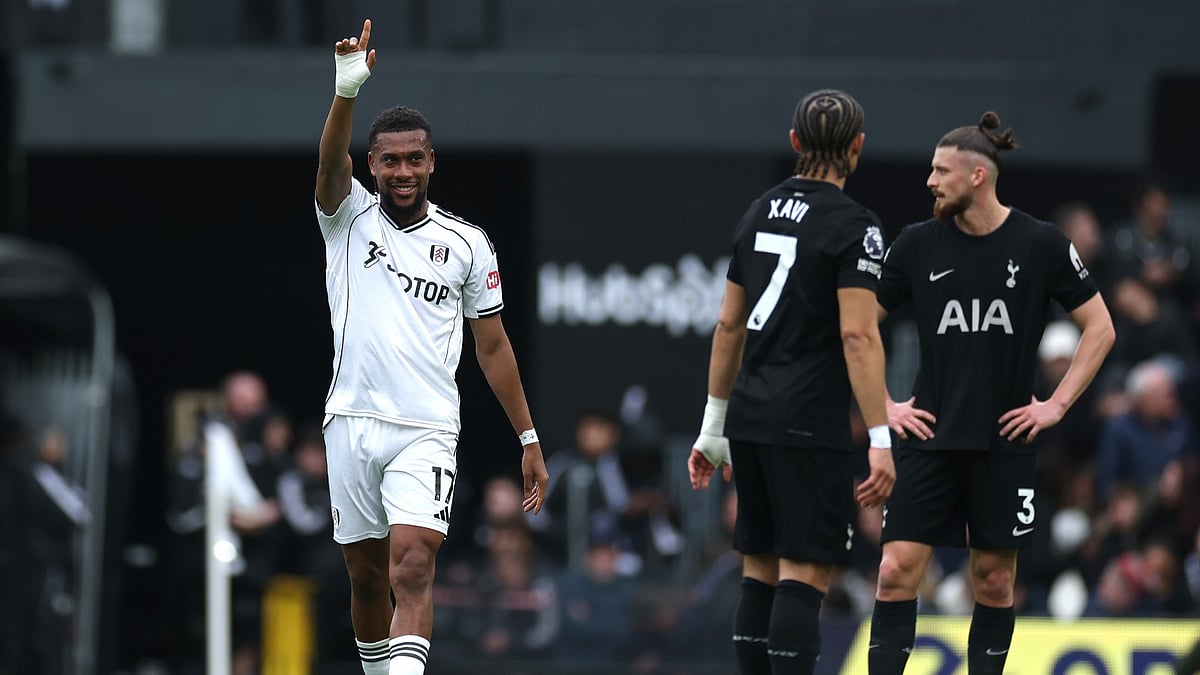 Alex Iwobi celebrates his goal as Fulham defeat Tottenham 2-1 at Craven Cottage.